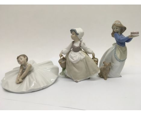 3 Nao figurines of young girls.