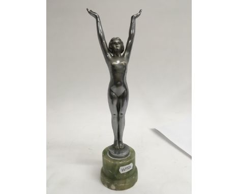 An Art Deco chrome and marble figure of a nude maiden with arms outstretched.