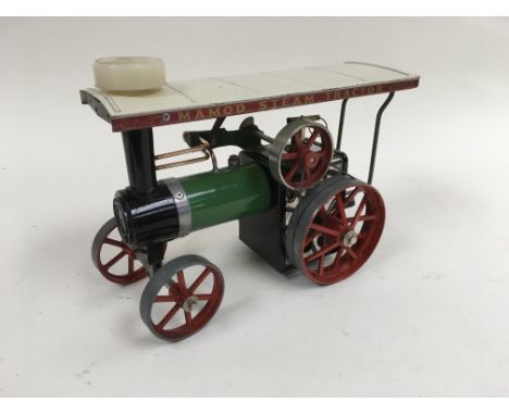 A Mamod steam tractor.