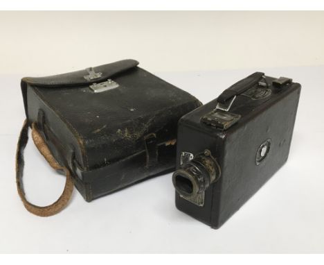 A Kodak model BB junior cine camera in a fitted leather case.