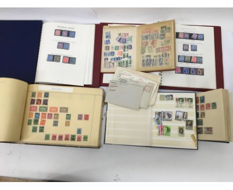 A collection of stamp albums including Jersey, commonwealth etc