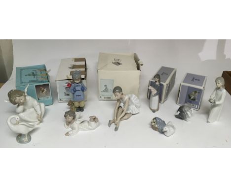 A boxed Nao ballerina and various Lladro figures