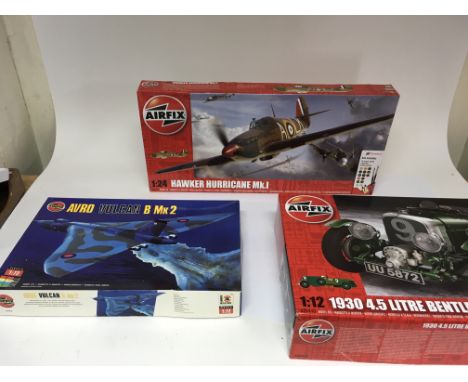 A collection of 3 boxed airfix model kits including a Hurricane MK1, A 1930 4.5 Bentley and a Vulcan bomber MK2