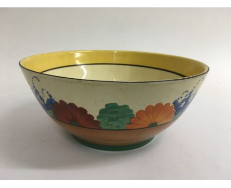A Clarice Cliff bowl in Gayday pattern, approx diameter 22cm.