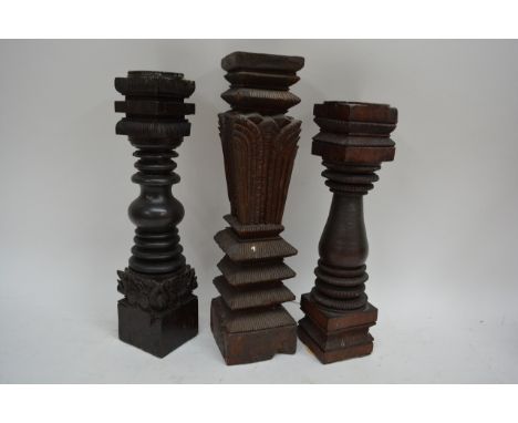 Three old Indian carved hardwood candle sticks, and two tourists Tribal Art African figures,