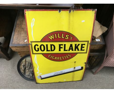 A large portrait enamel sign advertising for Will's gold flake cigarettes.