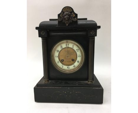 A black slate mantel clock made by R.A. Jones of Southend-On-Sea.
