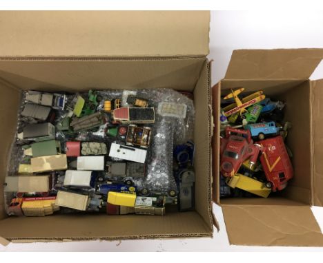 A box containing unboxed models of yesteryear and others together with a small box of corgi/matchbox vehicles.