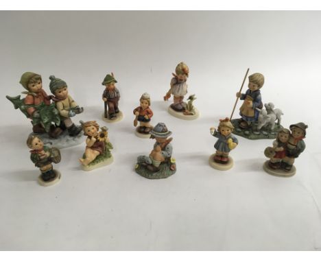 A collection of 10 Goebel figurines.
