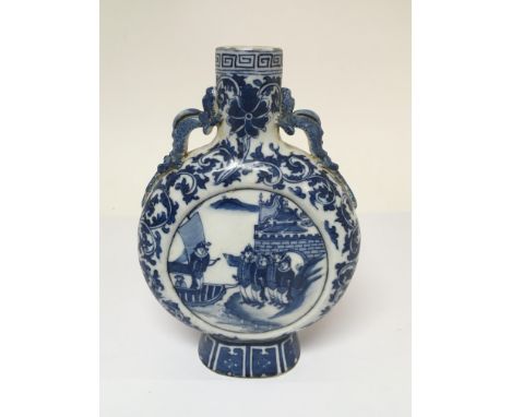 A blue and white moon flask with panels depicting figures standing on a shoreline looking to another figure on a boat, approx