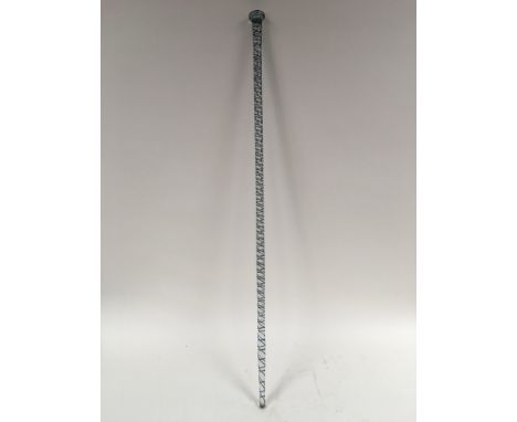 A glass walking stick with twisted decoration, approx 1 metre long.