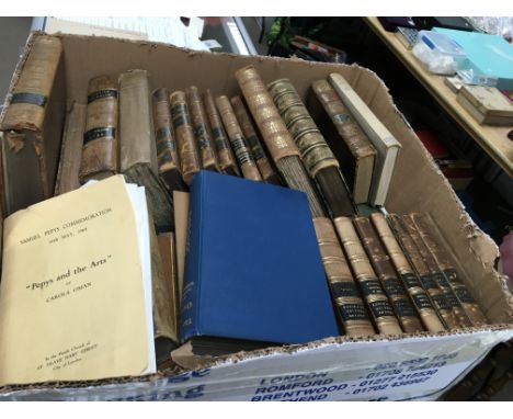 A collection of leather bound books including T.E Lawrence and Sam Pepys.