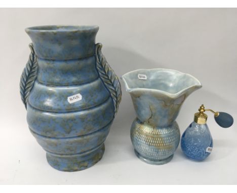 2 Art Deco style wall masks with 2 Art Deco style jugs together with a perfume bottle.