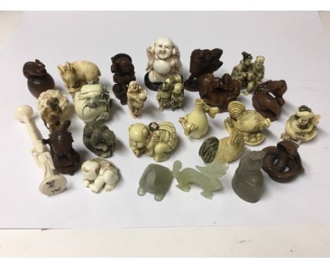 A collection of modern netsuke, three jadeite objects etc.