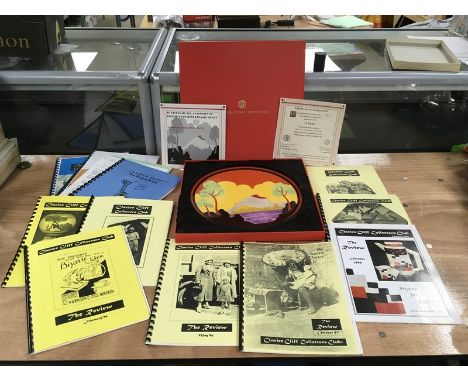 A boxed Bradford Exchange limited edition 'Etna' charger produced for the centenary of Clarice Cliff, plus collector's club m