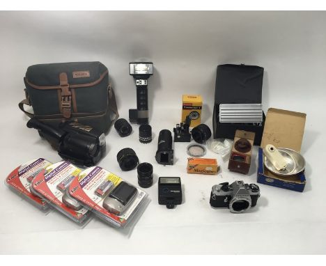 A mix of tele converters, flashguns, including a JVC VHS video recorder, a Pentax camera body and 3 rechargeable battery kits