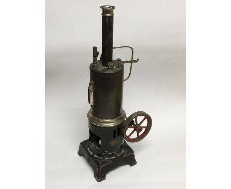 A German DC steam engine model with original instructions.