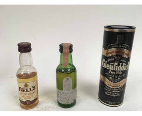 Two boxes of various miniature whiskies and other alcohols including Lagavulin 16, A boxed miniature glenfiddich special rese
