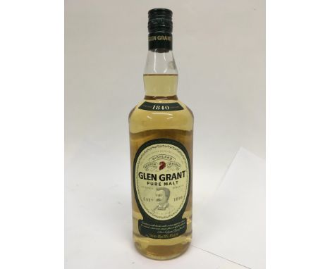 A bottle of Glen Grant pure malt Scotch whiskey.