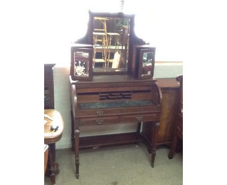 An Edwardian Bureau writing desk with drop front. Bureau stands at approximate 67 inches tall and 37 inches wide. Mirror has 