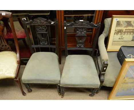 An Edwardian lounge suite comprising of three chairs and sofa in blue draylon