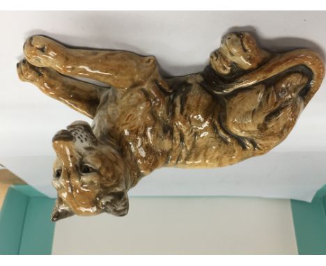 A pottery model of a lioness.Approximately 19cm