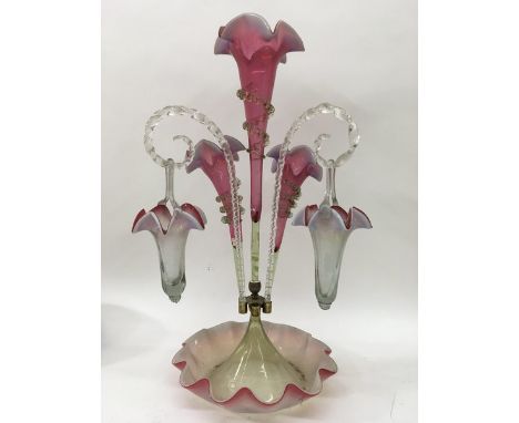 A cranberry epergne approx 54cm in height.
