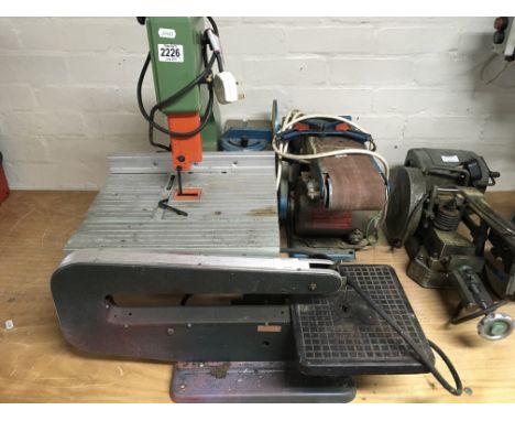 A small Sealey bench top band saw together with a bench sander and fret saw