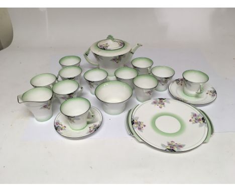 An Art Deco royal Albert "Laburnum" tea set. Damaged and repaired