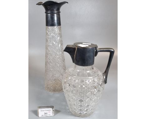 Hobnail cut baluster decanter or claret jug with silver mount and handle together with a similar cut glass tapering silver co