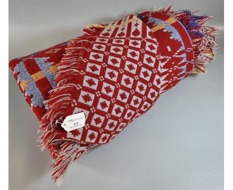 Dark red ground Welsh tapestry woollen geometric design blanket with fringed edge. (B.P. 21% + VAT)No obvious damage. 182 x 2