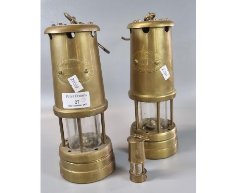 Two brass Miner's lamps marked 'Hockley' and a miniature miner's lamp.  (3)  (B.P. 21% + VAT) 