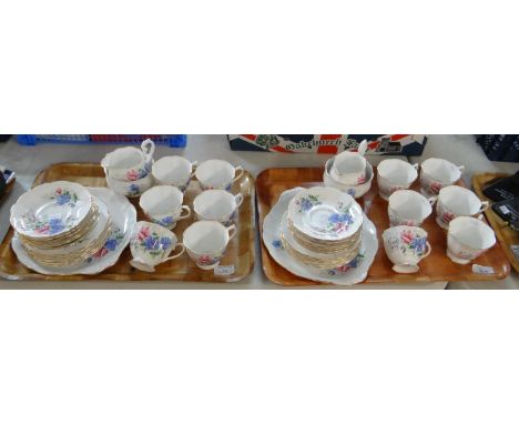 Two trays of Royal Albert English bone china Friendship series 'Sweet Pea' design teaware to include: teacups and saucers, pl