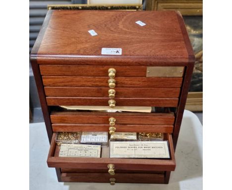 Wooden table top multi-drawer watch makers/collectors cabinet containing various watch and jewellery making equipment and acc