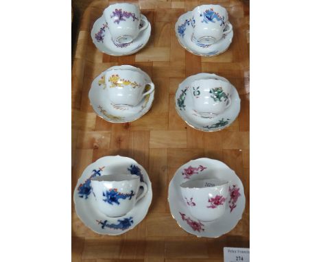 Set of six Meissen coffee cups with saucers in dragon pattern in various colourways. Blue crossed sword marks to bases. (B.P.