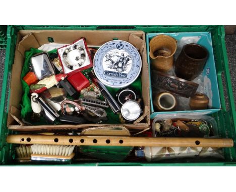 Box containing assorted items to include: a bamboo flute, a ceramic toothpaste shaped toothbrush holder, dressing table items