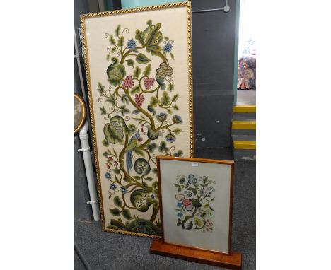 Large 17th century style needlework tapestry panel depicting foliate designs together with a similar smaller panel set into a