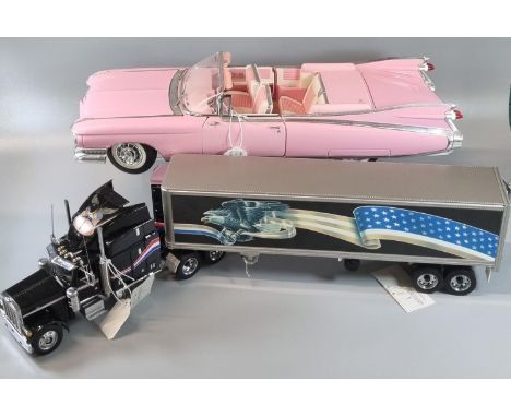 Franklin Mint Precision Models 'Peterbilt Model 379 refrigerated trailer', together with a model of a Maisto 1:12 scale Cadil