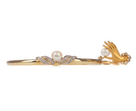 PEARL AND DIAMOND RING,in the form of a hand clutching a pearl with round brilliant cut diamond accents, with foreign marks, 