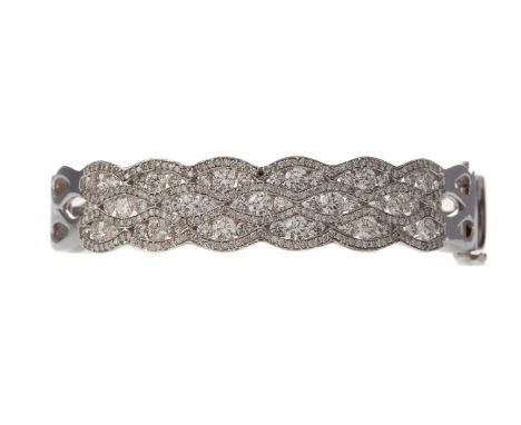DIAMOND BANGLE,set with round brilliant cut diamonds, some missing, totalling approximately 3.00 carats, unmarked, 38.1gProve
