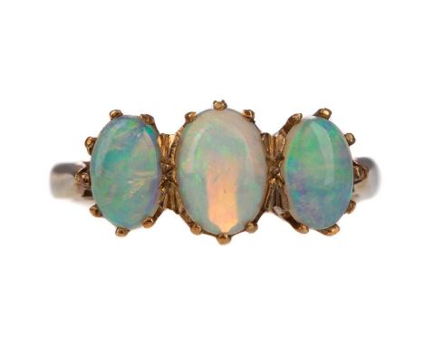 OPAL THREE STONE RING,in nine carat gold, size K 1/2, 3gCondition report: In generally worn condition.&nbsp;Minor chips and s