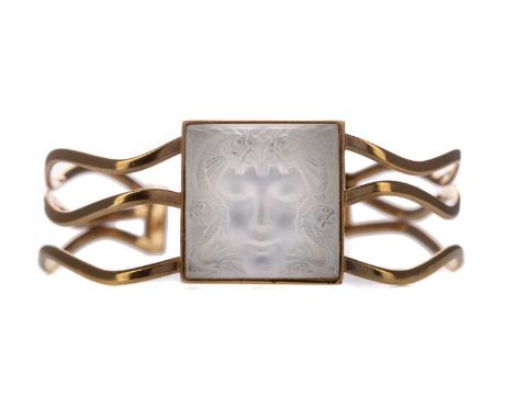 LALIQUE 'MASQUE DE FEMME' CUFF,with square carved crystal panel to the openwork cuff bangle, with box and paperworkCondition 
