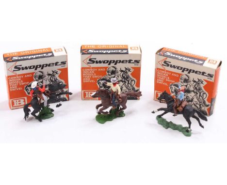 A Britains Swoppets Cowboy boxed figure group, three various examples to include No. 633 Cowboy Firing Twin guns, mounted, No