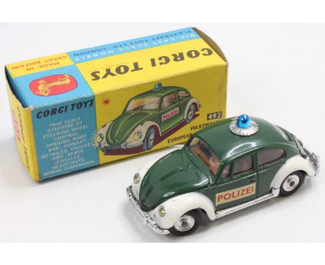 A Corgi Toys No. 492 Volkswagen European police car comprising of green and white body with spun hubs, housed in the original