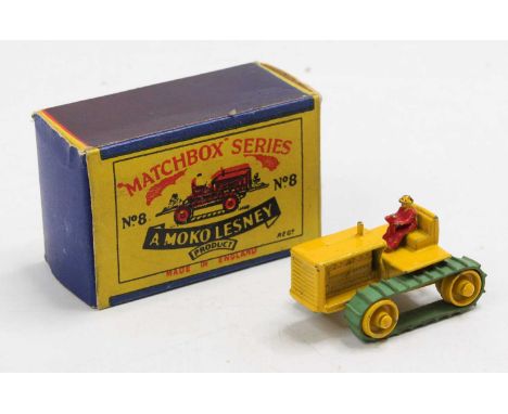 A Matchbox Lesney No. 8 Caterpillar Tractor comprising a yellow body, with yellow painted rollers, and a red driver figure, t