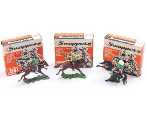 A Britains Swoppets boxed cowboy figure group, three various examples to include No. 632 Cowboy throwing lasso mounted, No. 6