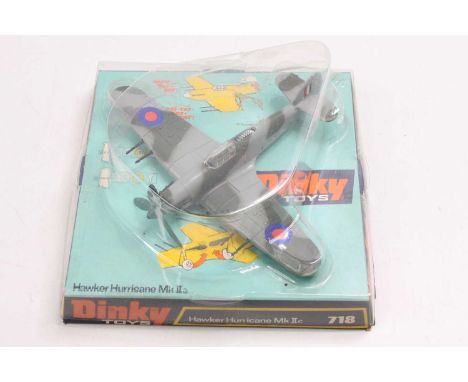 Dinky Toys No. 718 Hawker Hurricane Mk.II finished in grey/green camouflage, with R.A.F roundels, comes with its original bub