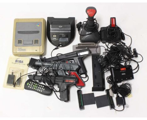 One tray containing a good selection of mixed retro gaming accessories, hand guns, and consoles to include a Sega Mega Drive 