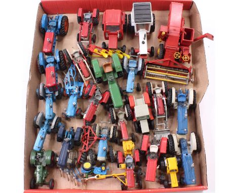 A collection of Britains, Corgi and Dinky model tractors, with specific examples including a Britains Massey Ferguson 135 Tra