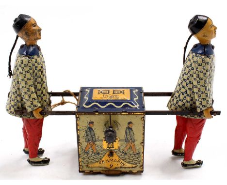 Lehmann Germany circa 1910 tinplate Tea Caddy comprising 2 standing/walking figures with patterned shirt, red trousers, and a